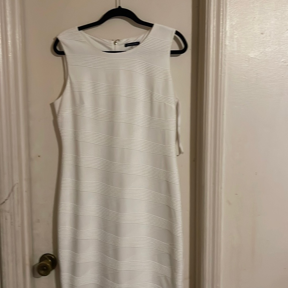 Tommy Hilfiger white dress to the knees excellent used condition size 12.